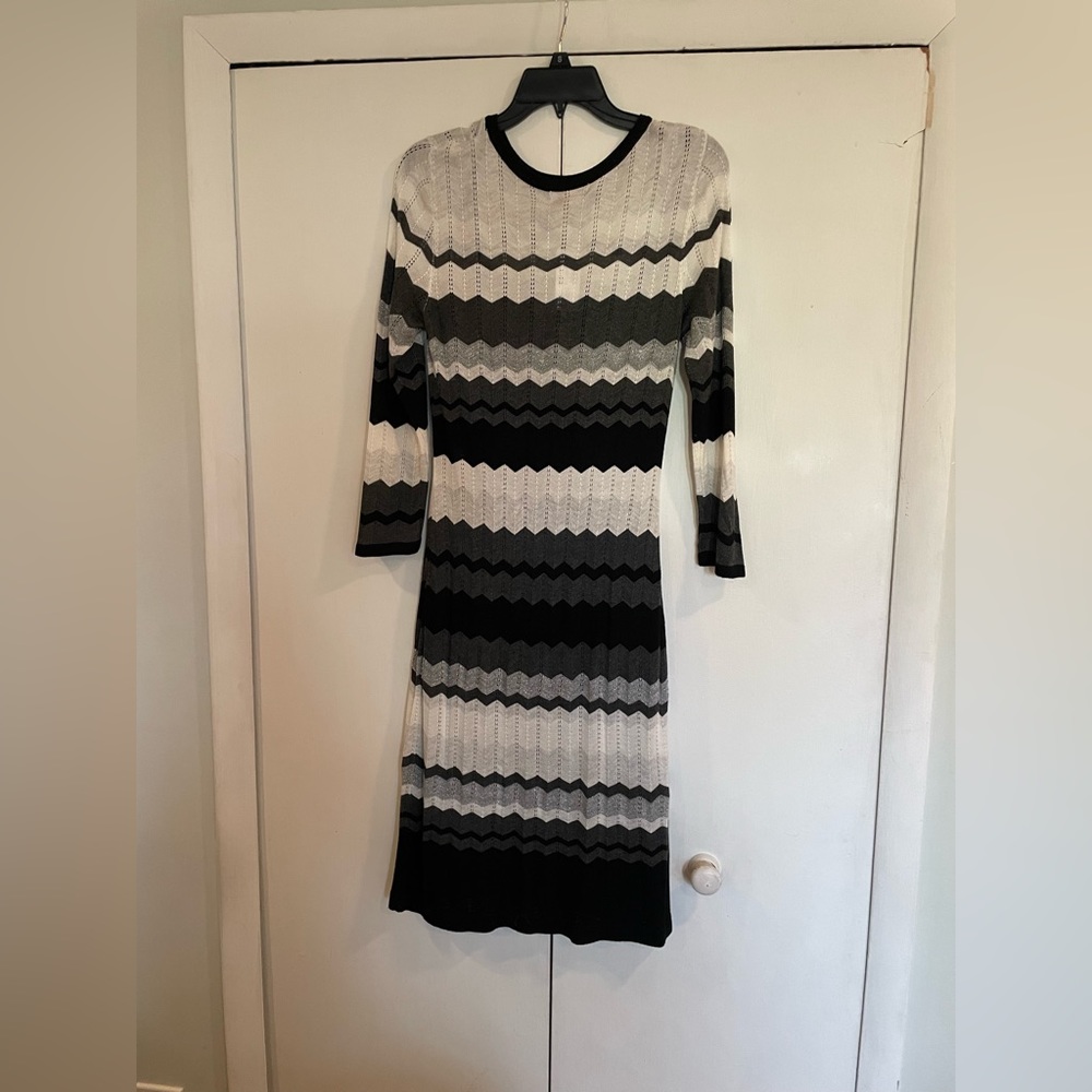 Beautiful grey, black & white sweater dress with the tags size Med.